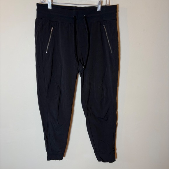 Athleta Pants - Athleta Trekkie North Jogger Black Drawstring Zip Pockets Athleisure Size 10